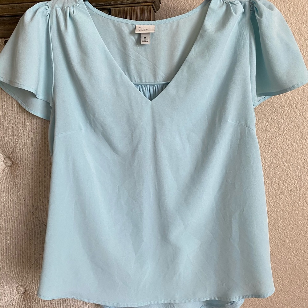 A New Day top